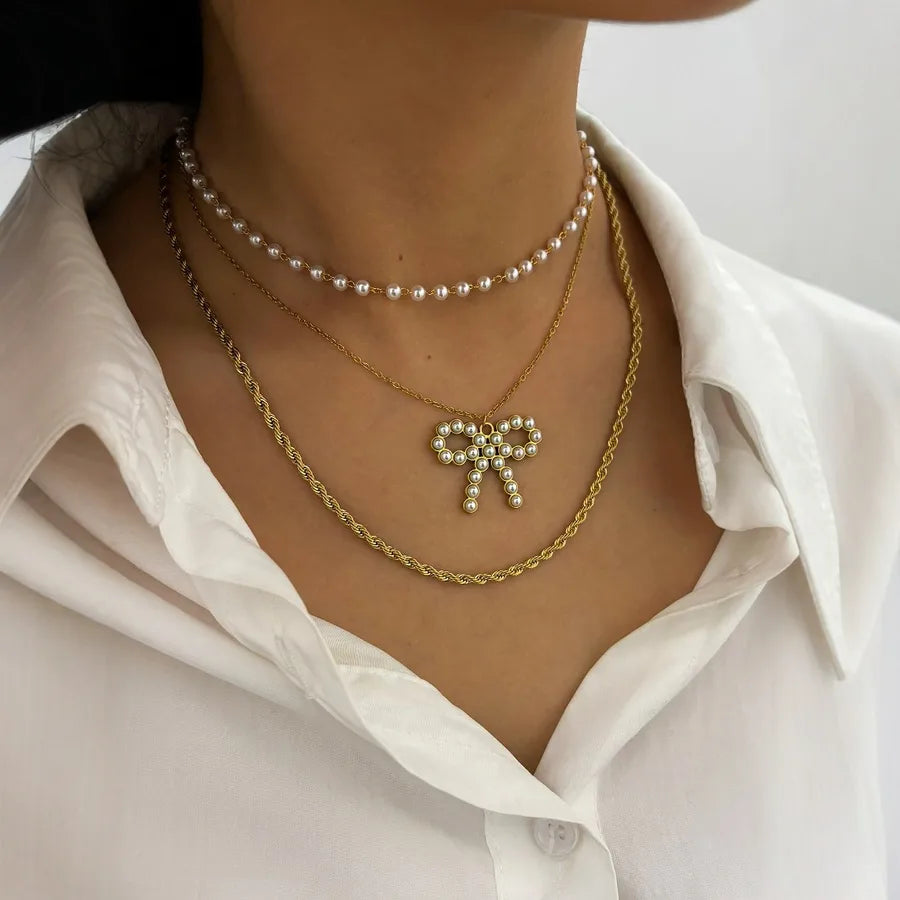 Trinity Bow - acessórios luxo minimalista Línia Portugal