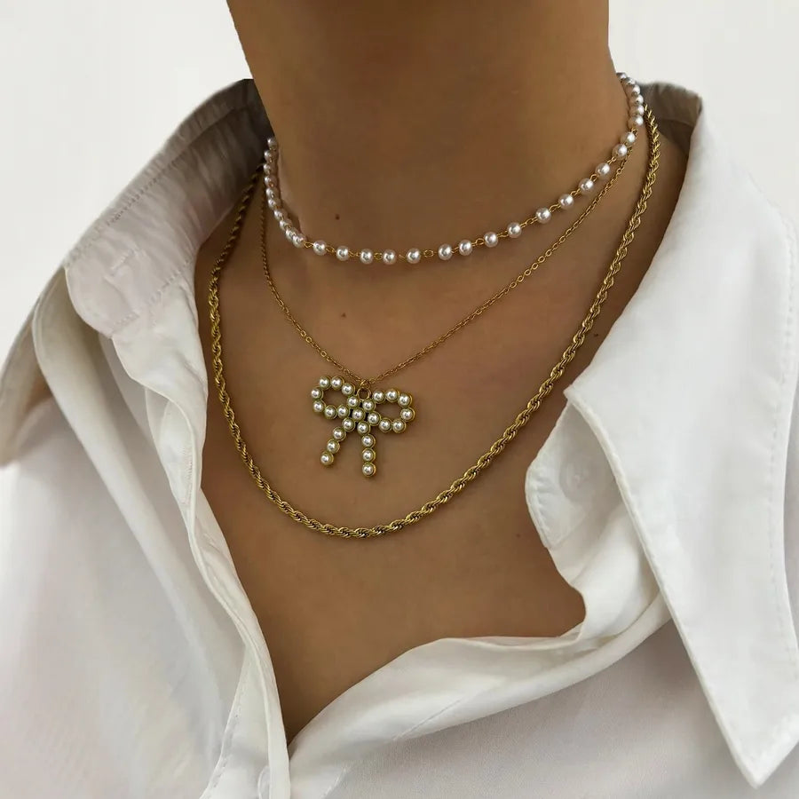 Trinity Bow - acessórios luxo minimalista Línia Portugal