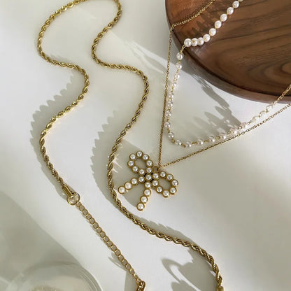 Trinity Bow - acessórios luxo minimalista Línia Portugal