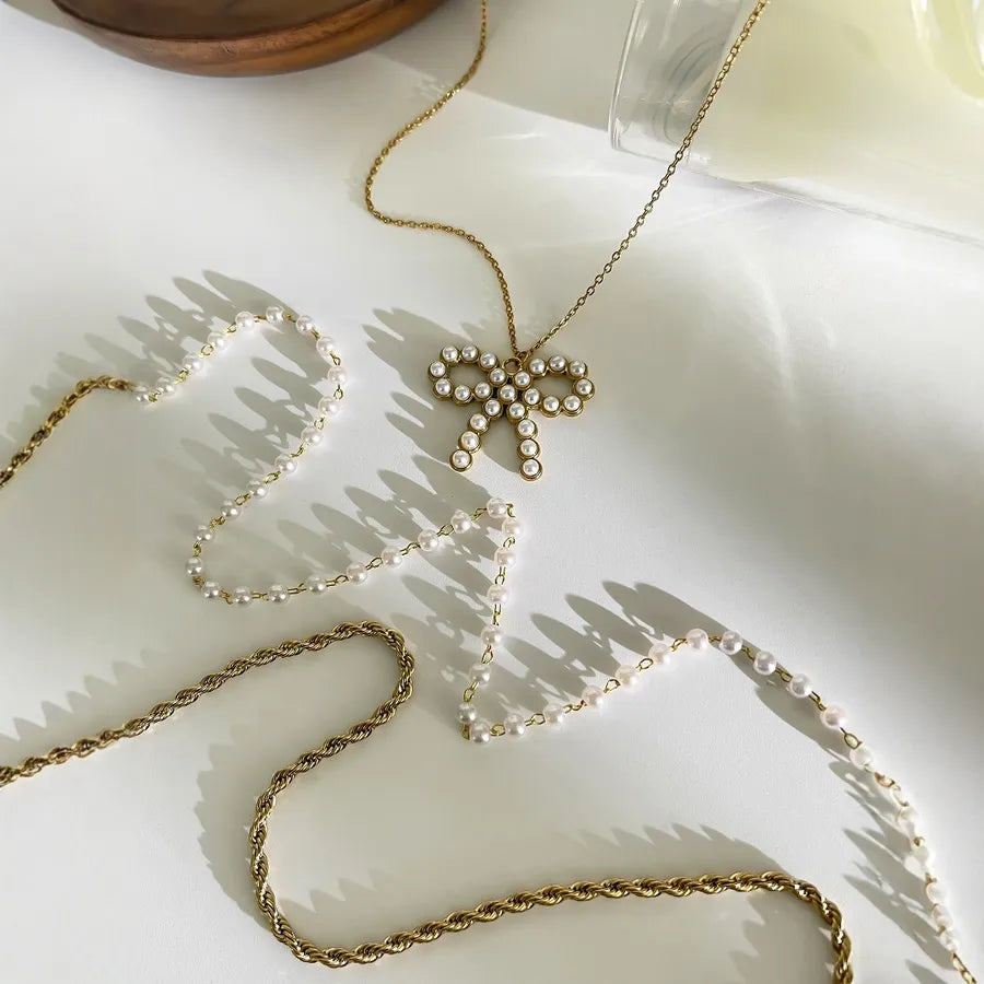 Trinity Bow - acessórios luxo minimalista Línia Portugal